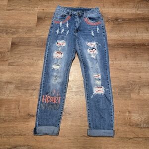 Stylish Blue Distressed Baseball Jeans with Red Accents Size Small